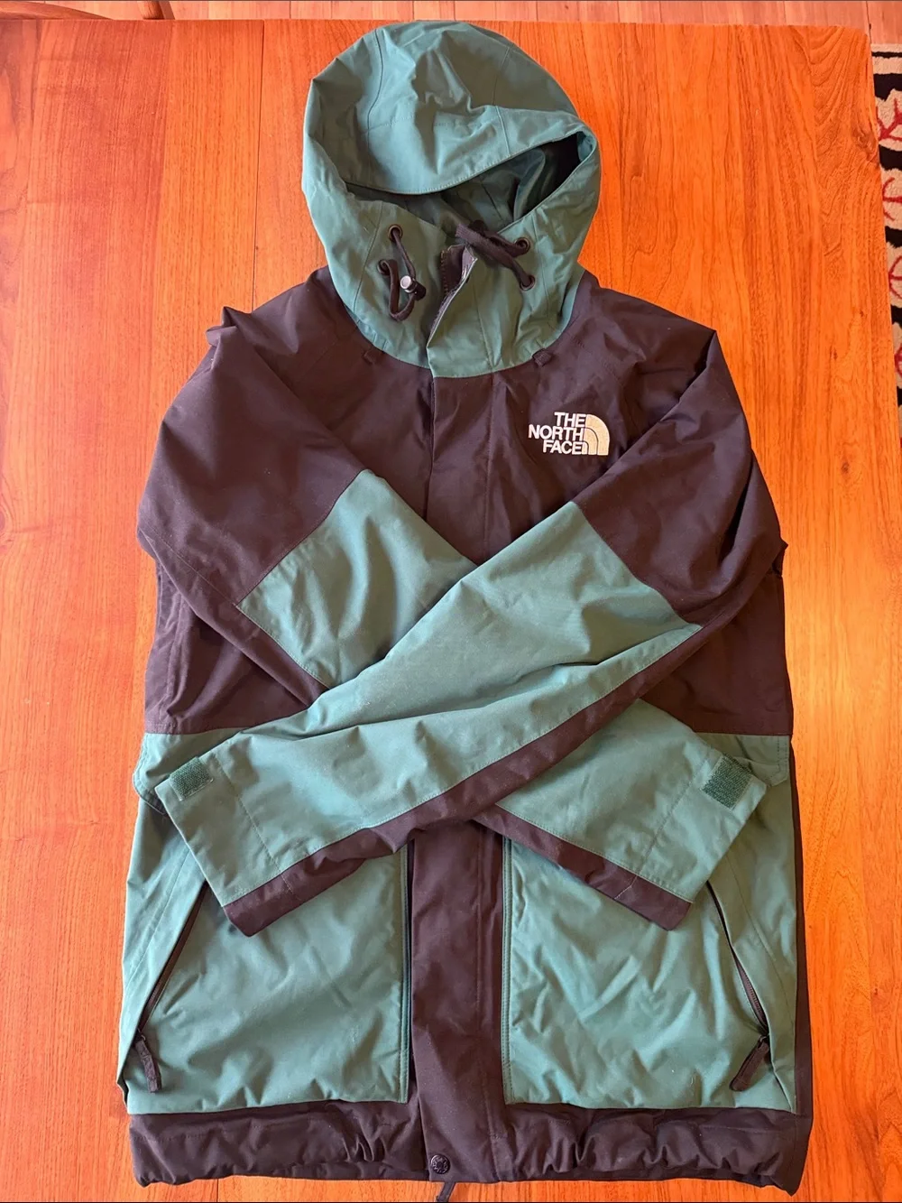 The North Face Black and Green Hooded Shell Jacket
